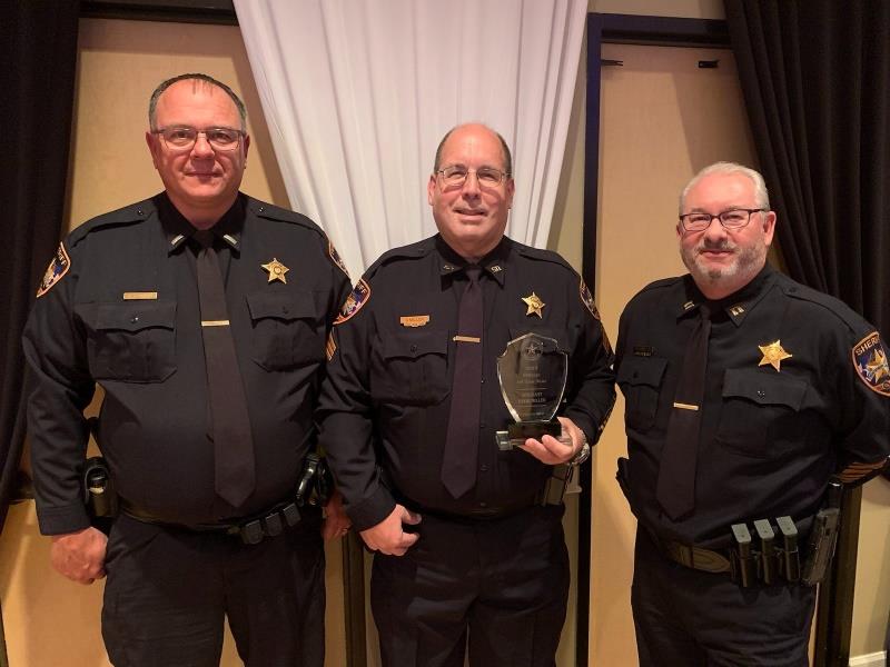 Photo of Sergeant David Miller, Detective Keith Billiris, and Captain Melvin Franklin with their Award at the East Montgomery County Improvement District Law Enforcement Appreciation Dinner.